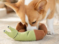 Dog sniffing the snail snuffle toy